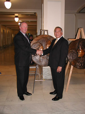 Senator Charles Ford (R-Tulsa) and Senator Kelly Haney (D-Seminole) at the dedication of four bronze roundels which will be placed at the entrances of the House and Senate Chambers. The roundels represent the tribes of eastern and western Oklahoma.