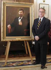 Former State Senator Gary Gardenhire with portrait of his great-great uncle, George W. Gardenhire, first President of the Territorial Council of Oklahoma.