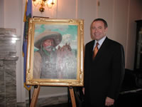Sen. Morgan with painting of Pistol Pete.