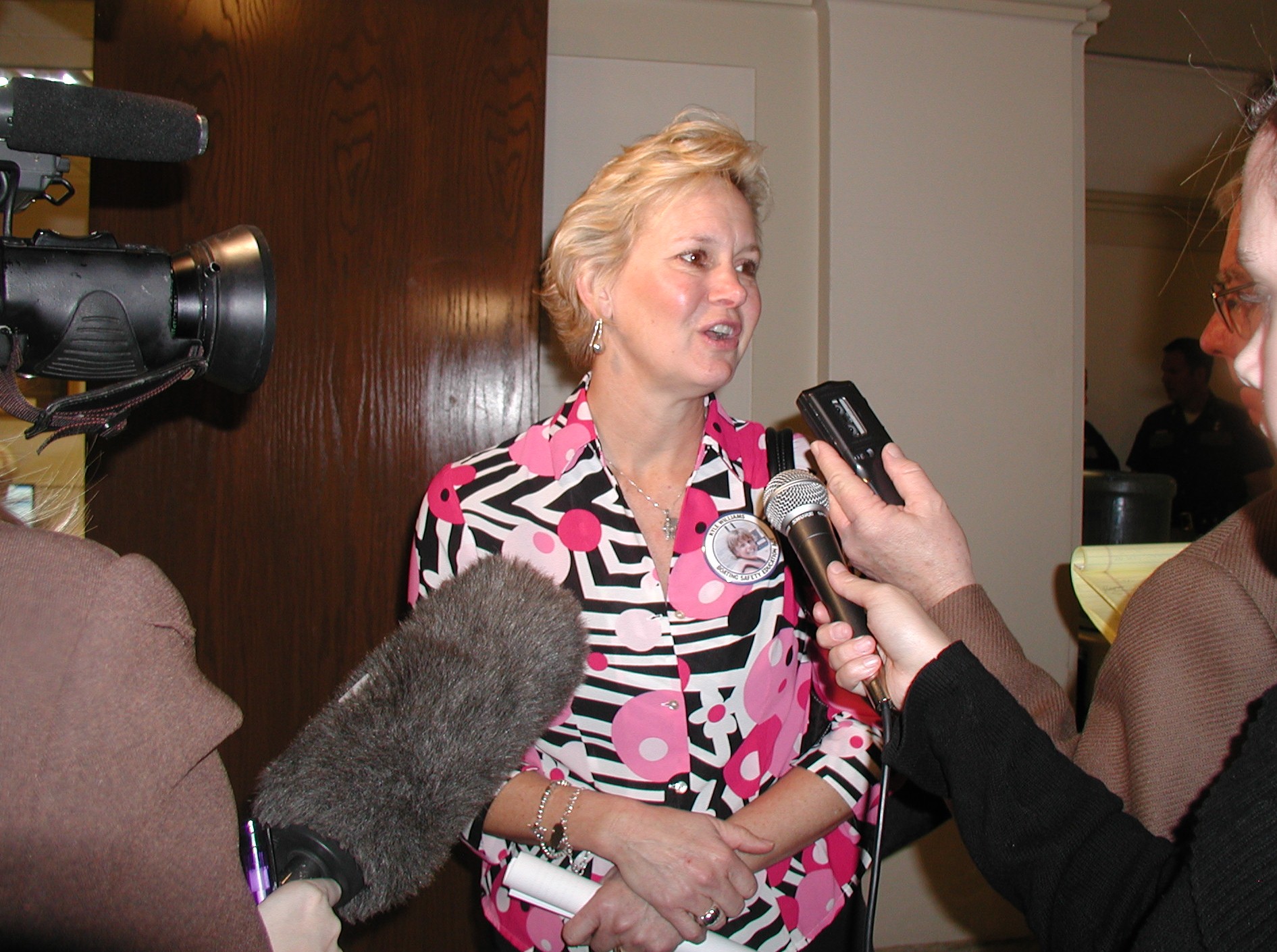 Sue Williams talks to reporters following passage of SB 1495, the Kyle Willaims Boating Safety Education Act.