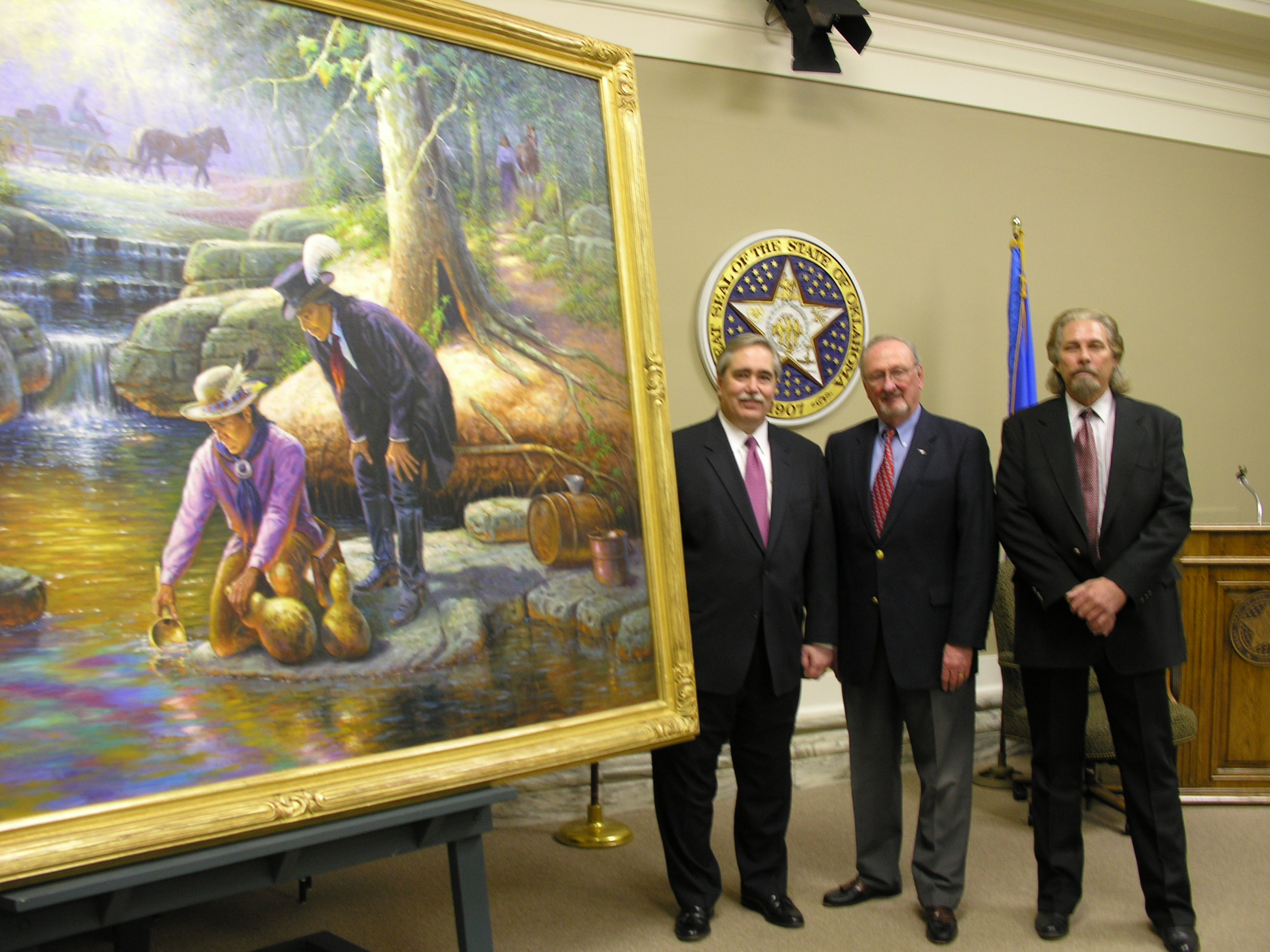 President, Chairman and CEO of ONEOK David Kyle, Charles Ford and artist Wayne Cooper.