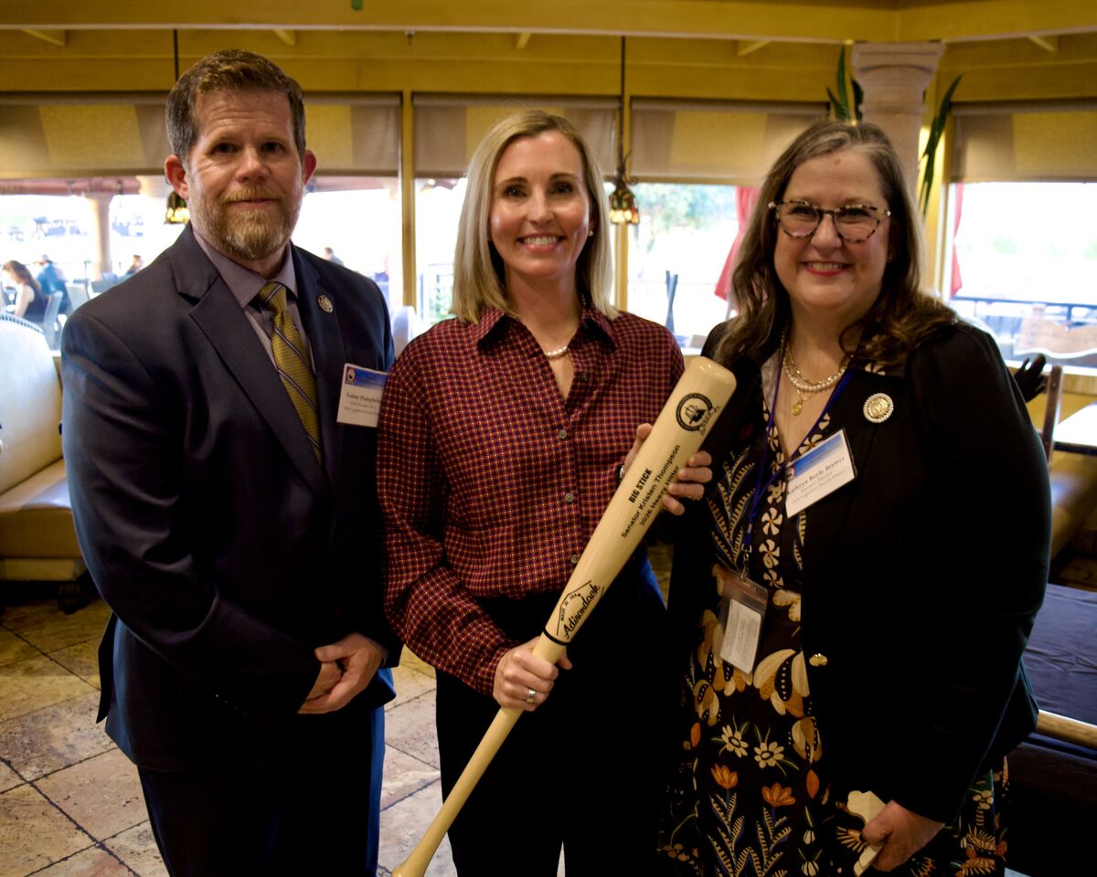Sen. Kristen Thompson R-Edmond, is pictured with Kathryn Brewer, executive coordinator of the Oklahoma District Attorneys Council and Canadian County District Attorney, Tommy Humphries. The District Attorneys Association recently honored Thompson with its 2026 Heavy Hitter Award in recognition of her work at the Capitol.