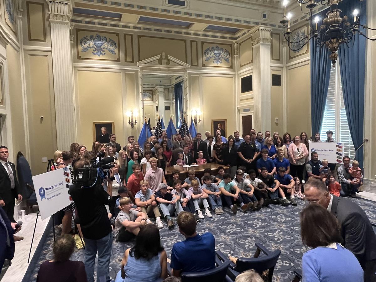 Supporters and students gather for the ceremonial bill signing of the Mason Treat Act