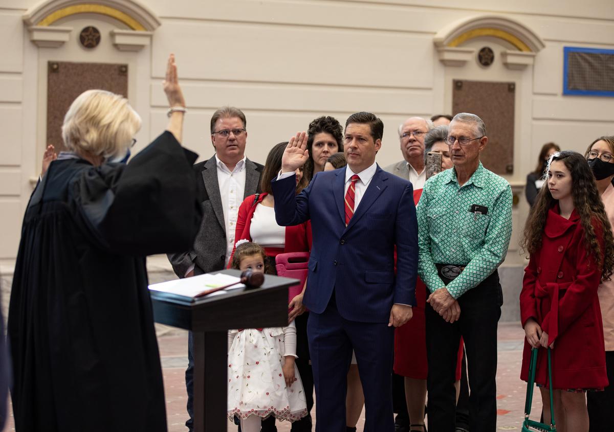 Sen. Shane Jett, R-Shawnee, takes the oath of office in the Senate Chamber Monday.