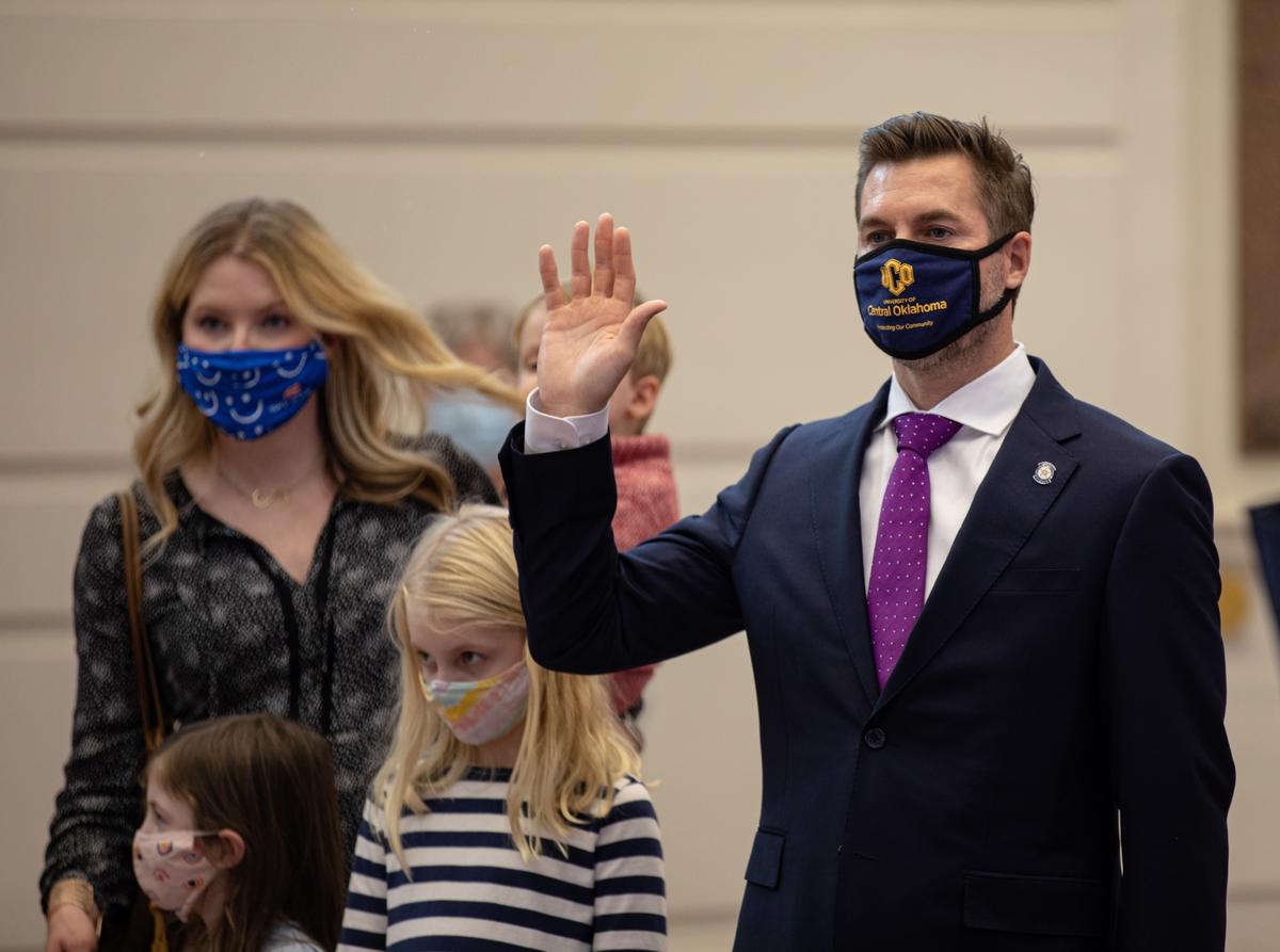 Sen. Adam Pugh, R-Edmond, took the official oath of office Monday in the Senate Chamber with his wife, Sarah, and their three children. 