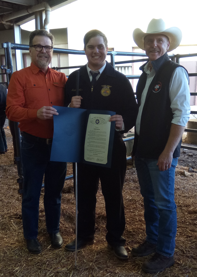 Senator Micheal Bergstrom, R-Adair (left) is joined by Rep. Rusty Cornwell and Bluejacket High School Junior Justin Herlan at the Oklahoma Youth Expo event at the State Fairgrounds this week.