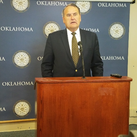 Senate Democratic Leader John Sparks visits with the media Thursday.