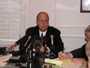 Senator Taylor discusses the Texas Plan with reporters at his State Capitol news conference.
