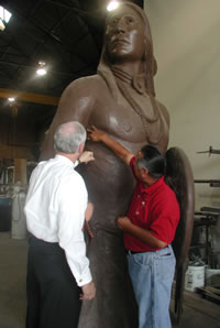 Governor Keating and Senator Haney Look at "The Guardian."