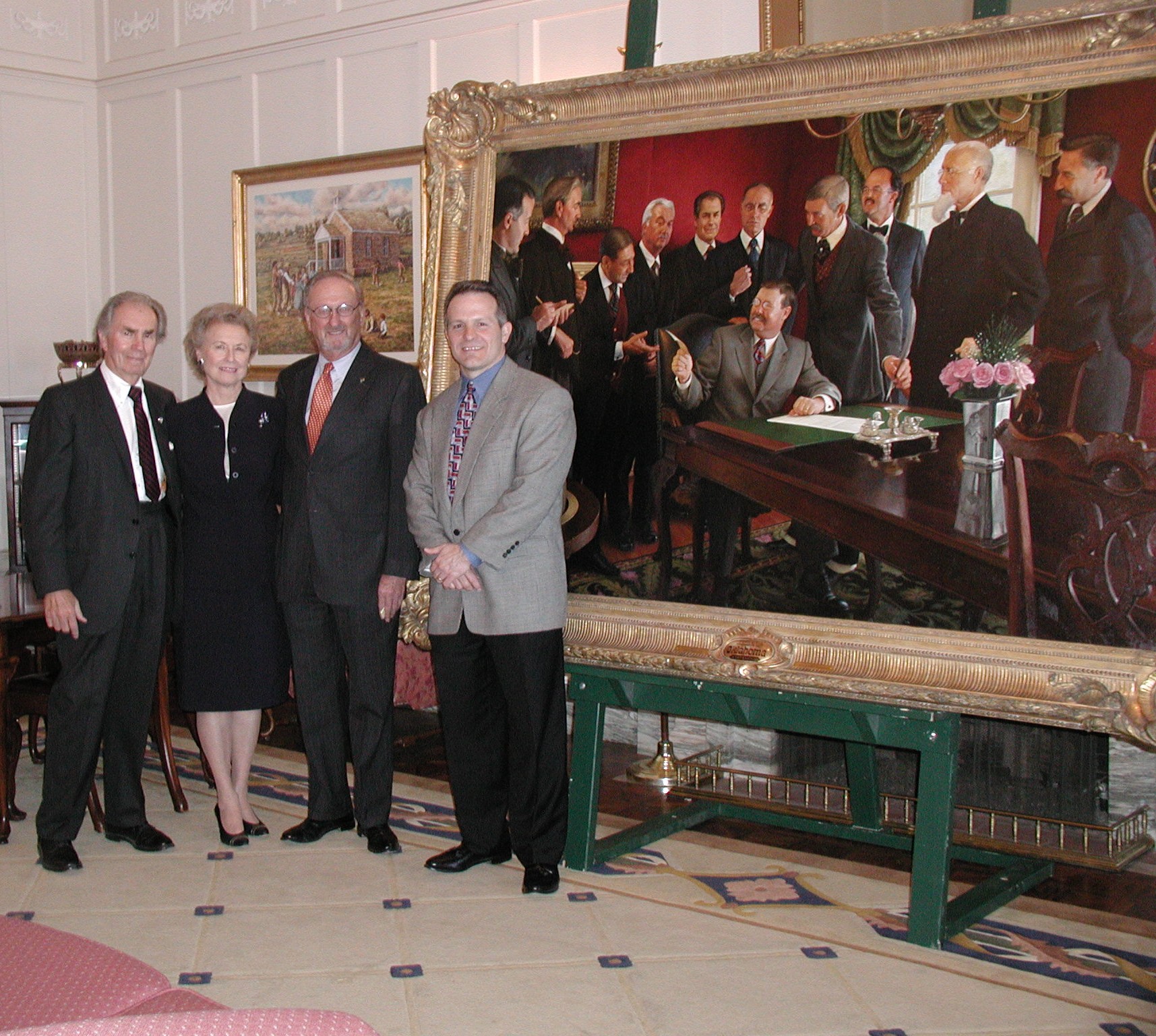 Walt Helmerich, Peggy Helmerich, Sen Ford and Mike Wimmer with painting