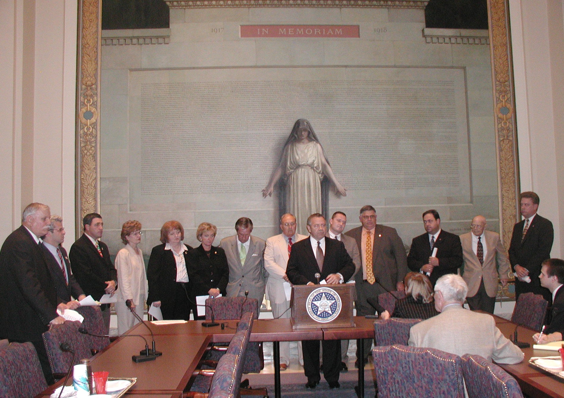 Senate President Pro Tem Mike Morgan addresses reporters following Sine Die along wtih other memebers of the Democratic caucus.