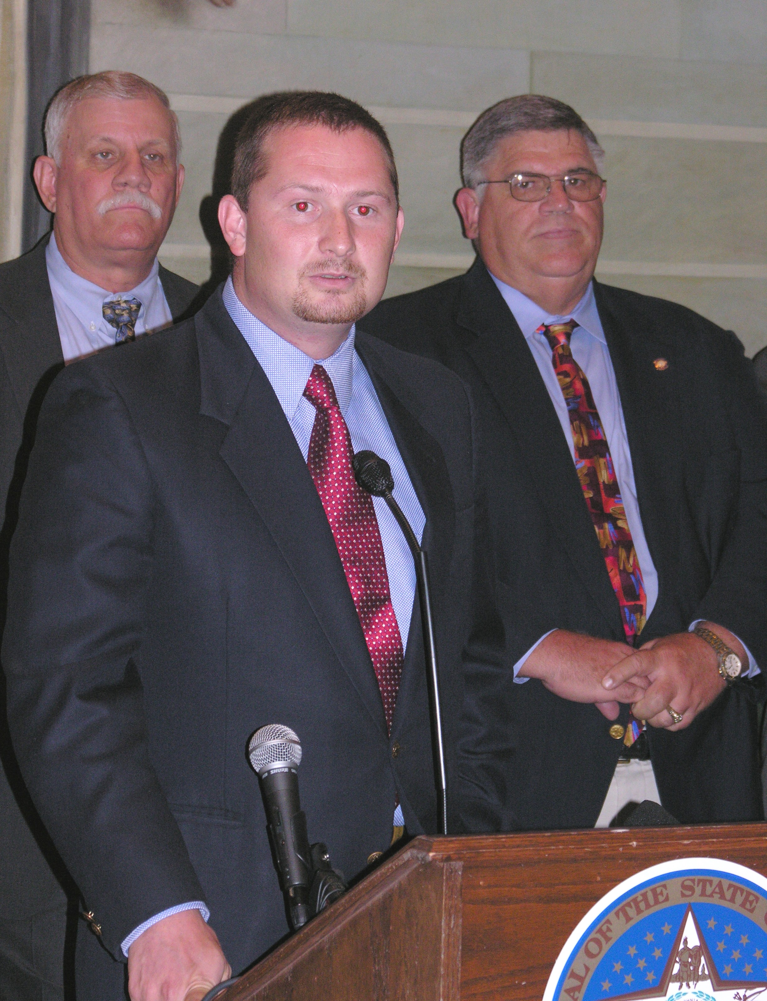 Senator Kenneth Corn discusses Democratic plan with press.