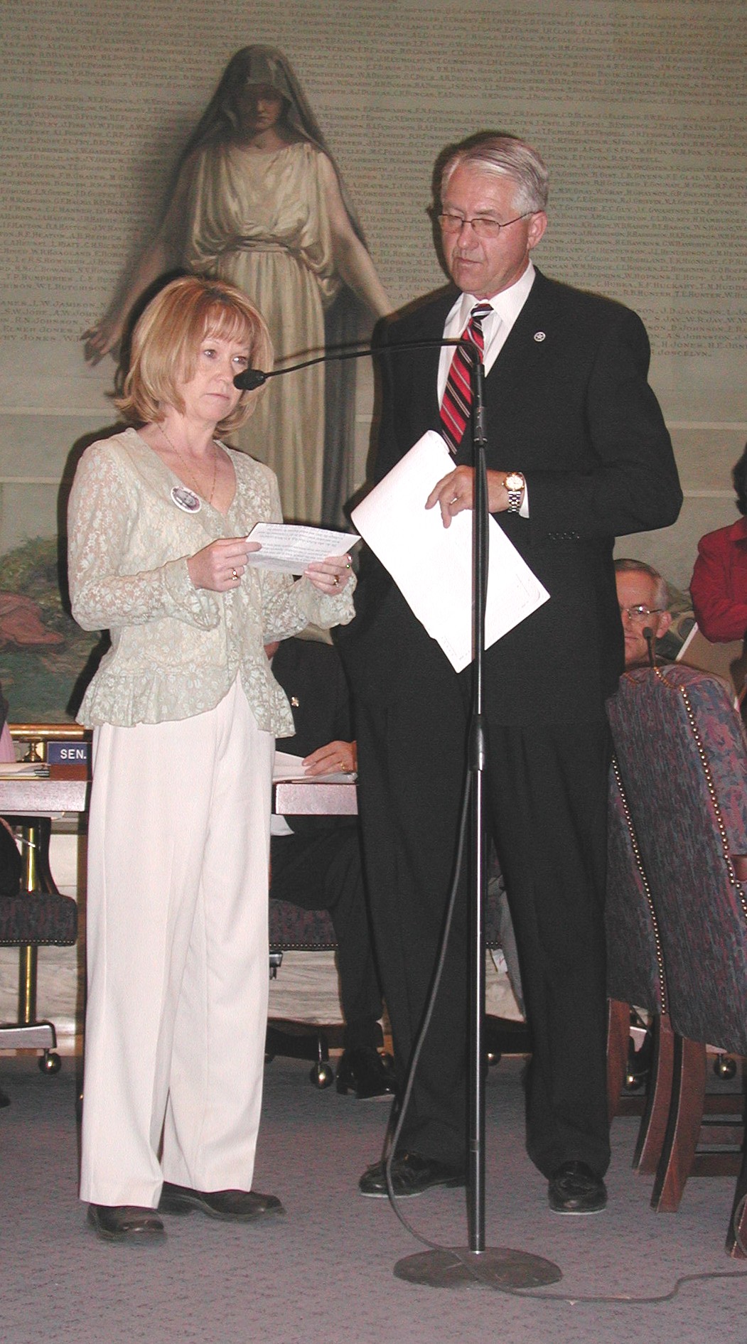 Kathie Briggs testifies before the Senate Judiciary Committee with Senator Harry Coates