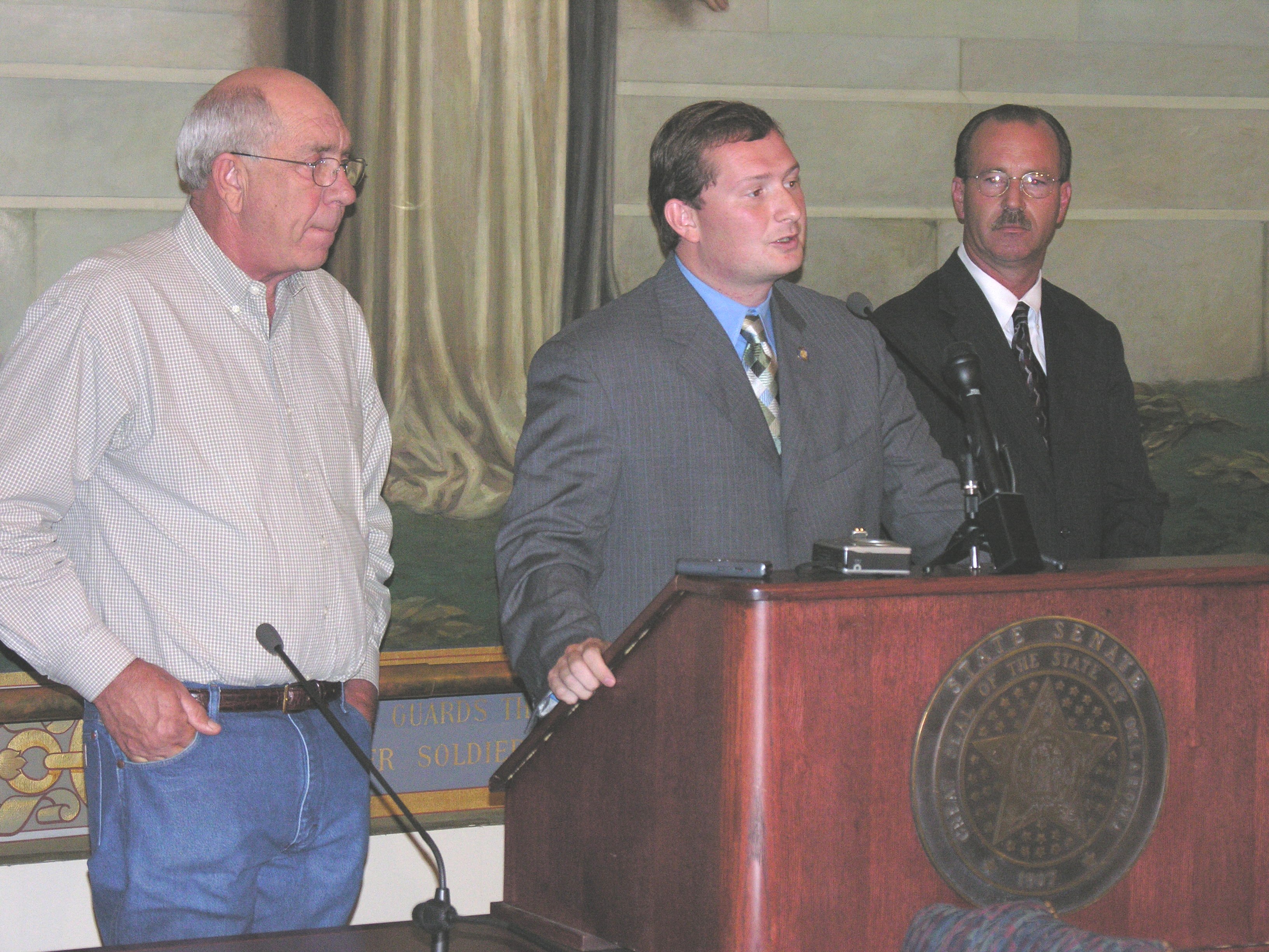Sen. Kenneth Corn, Rep. Glen Bud Smithson and AFL-CIO President Jim Curry