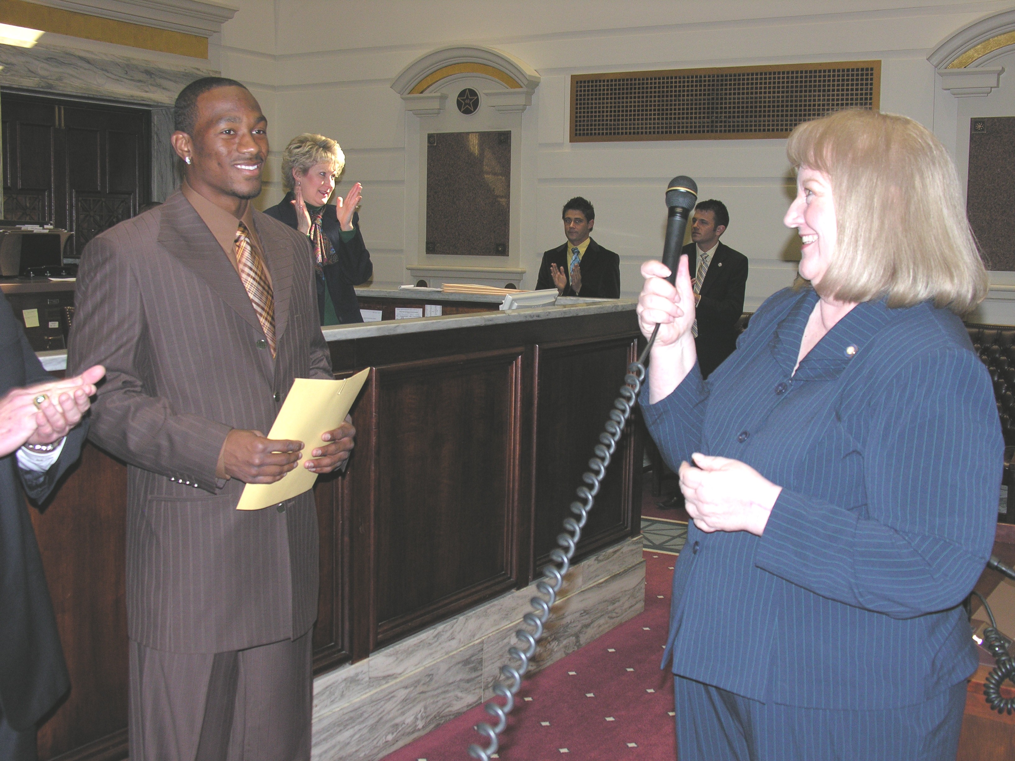 Sen. Debbe Leftwich introduces 2007 Jim Thorpe Award winner Antoine Cason.