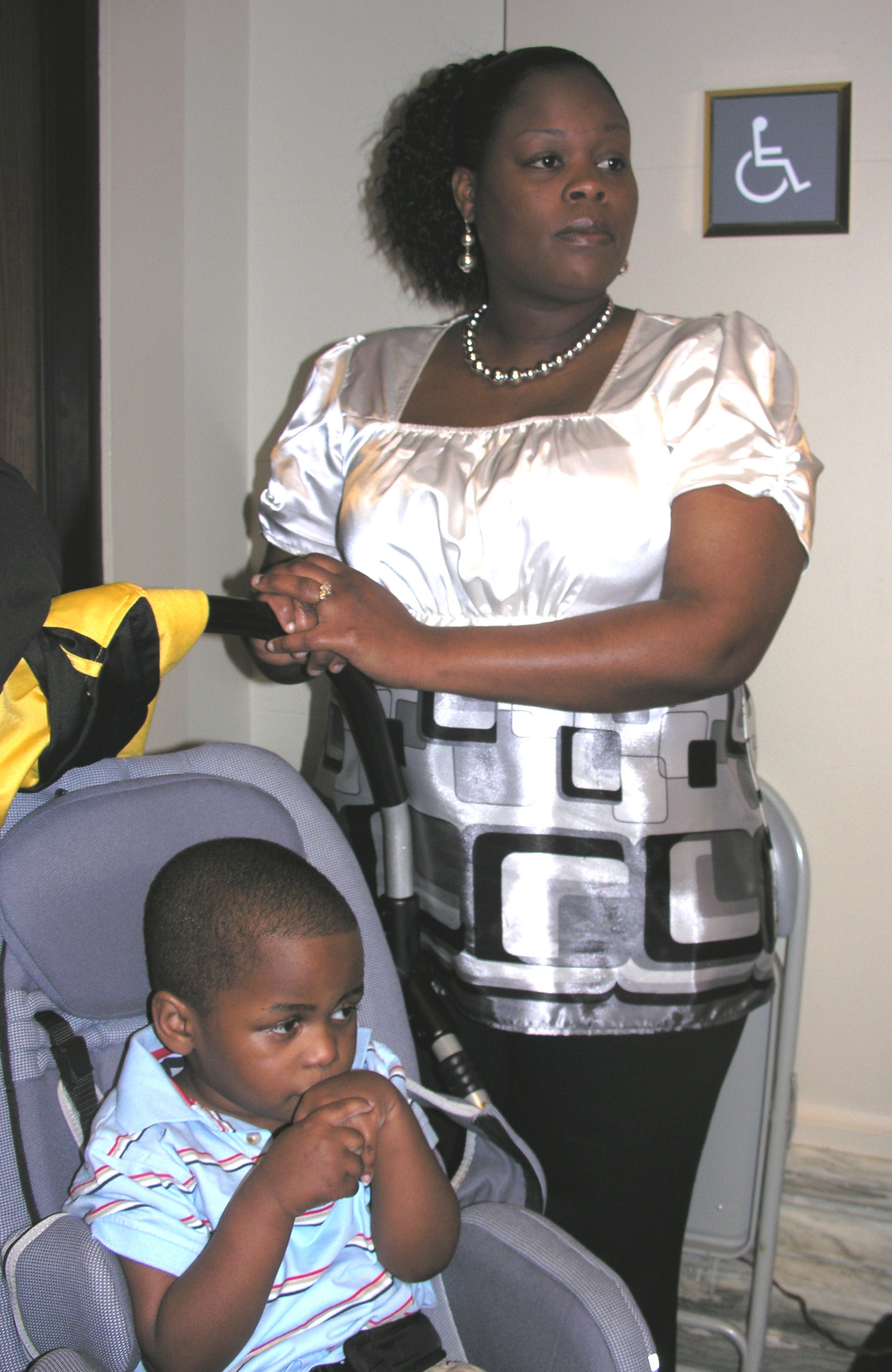 Edna Pittman and son Demarion await a vote on Demarion's Law in the Senate Rules Committee.
