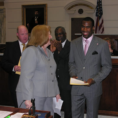 Senator Debbe Leftwich and 2008 Jim Thorpe Award winner Malcolm Jenkins.