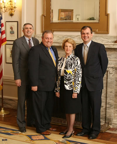 Sen. Ron Justice, Pres. Pro Tem Glenn Coffee, Donna McSpadden, and Sen. Sean Burrage after Senate passage of SCR 29. 