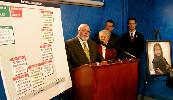 Keith and Dixie Swezey, Sen. Clark Jolley and Rep. Jason Nelson discuss the Elizabeth Swezey Act at the state Capitol on Wednesday. 
