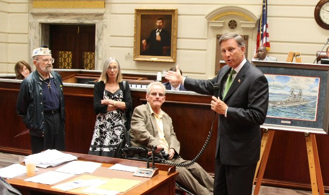 Retired US Navy Admiral Greg Slavonic addresses the Senate.
