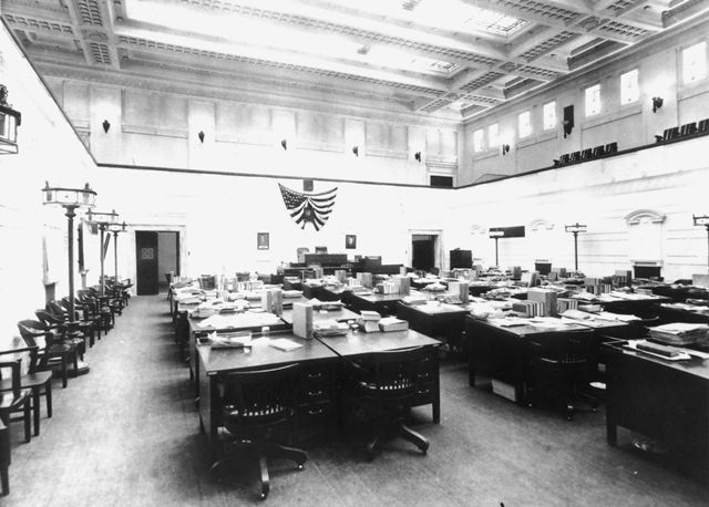 The Senate Chamber is shown in 1920, with its original floor lamps pictured around the boundary of the room.  