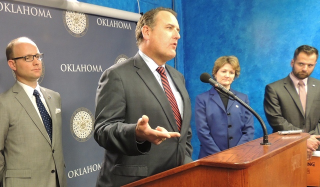 Senate Democratic Leader John Sparks shares his reactions to the governor's State of the State address alongside his colleagues Sen. Kay Floyd and  Sen. J.J. Dossett along wtih House Democratic Leader Scott Inman. 